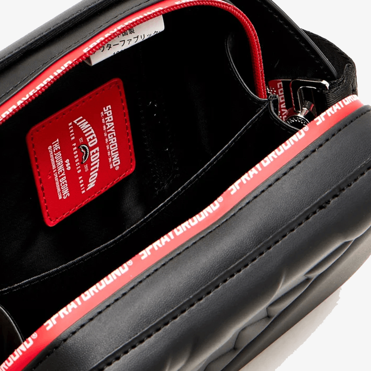 PRINTED ZIPPER HARD-SHELL SLING 